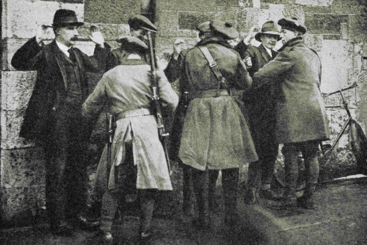 suspects-being-searched-in-dublin-ireland-in-1920-during-the-irish-war-of-independence-aka-anglo-irish-war-from-story-of-twenty-five-years-published-1935-752x501-1